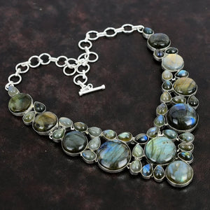 Necklace with Labradorite stones on a dark background