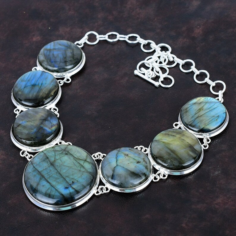 Necklace with Labradorite stones on a dark background