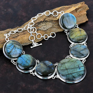 Necklace with Labradorite stones on a dark background