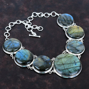 Necklace with Labradorite stones on a dark background